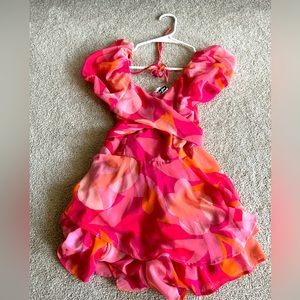 A blue sperro pink orange and red romper